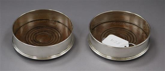 A pair of modern silver wine coasters London, 1979, 12.6cm.